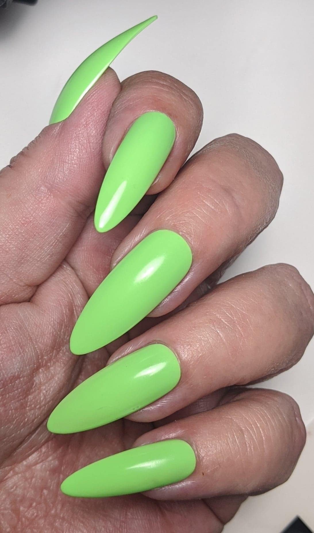 Closeup Of Woman Fingers With Nail Art Manicure With Neon Green Colour  High-Res Stock Photo - Getty Images